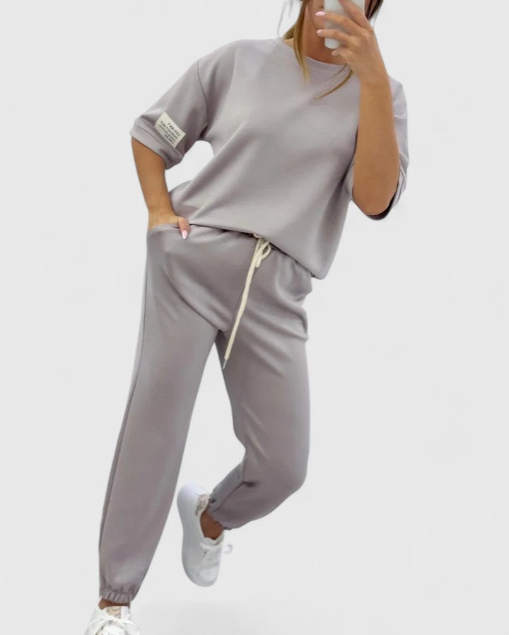 Glory Women’s Comfortable Set featuring a stylish half-moon sleeve top and adjustable ankle-length trousers, perfect for casual outings and relaxed days at home. 4