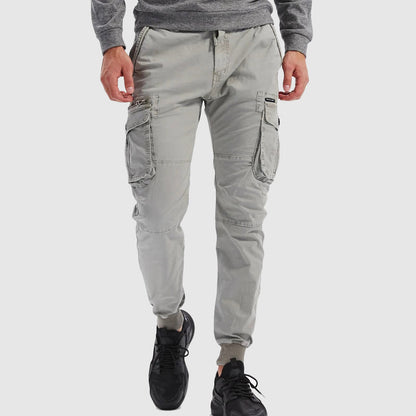 Grove Men's Cargo Joggers featuring adjustable drawstring, multiple pockets, and a stylish design for comfortable everyday wear. 2