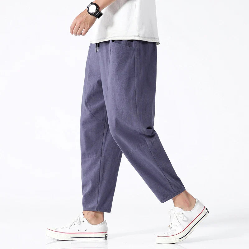 Grove Men’s Cropped Pants featuring an adjustable drawstring waist and articulated paneling for enhanced comfort and style. 0