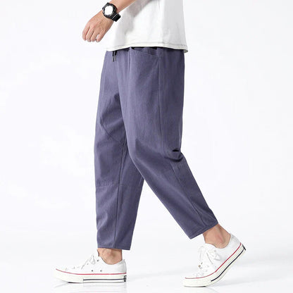 Grove Men’s Cropped Pants featuring an adjustable drawstring waist and articulated paneling for enhanced comfort and style. 0