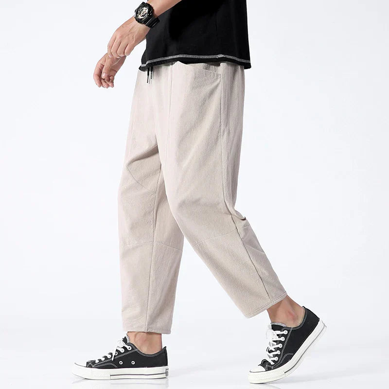 Grove Men’s Cropped Pants featuring an adjustable drawstring waist and articulated paneling for enhanced comfort and style. 2