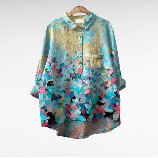 Gwyneth Women’s Vintage-Style Blouse featuring a delicate floral pattern, perfect for adding a touch of retro charm to any outfit. 0