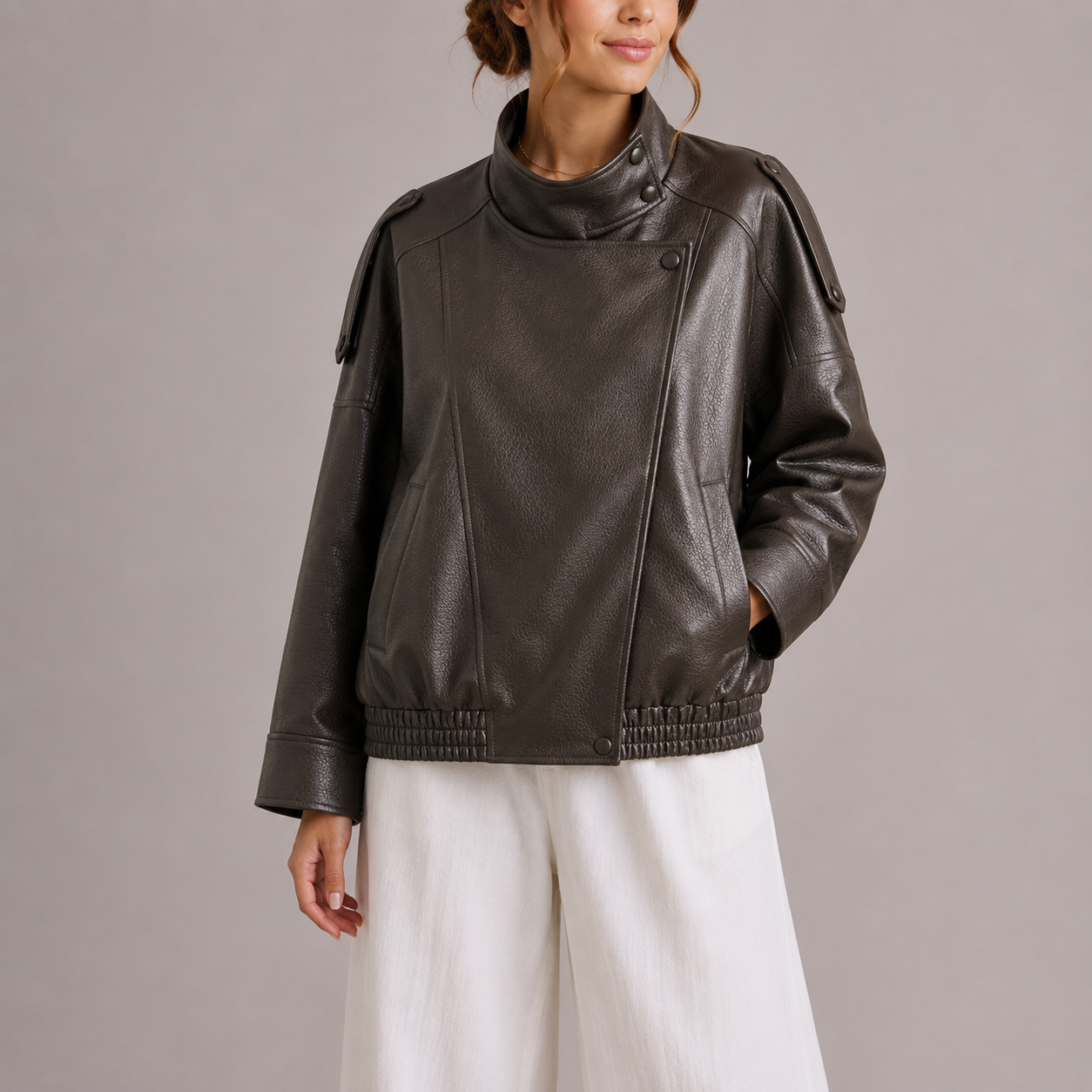 Haven Women's Bomber Jacket featuring a stylish faux leather design, high collar, and oversized fit, perfect for trendy fall and winter outfits. 1