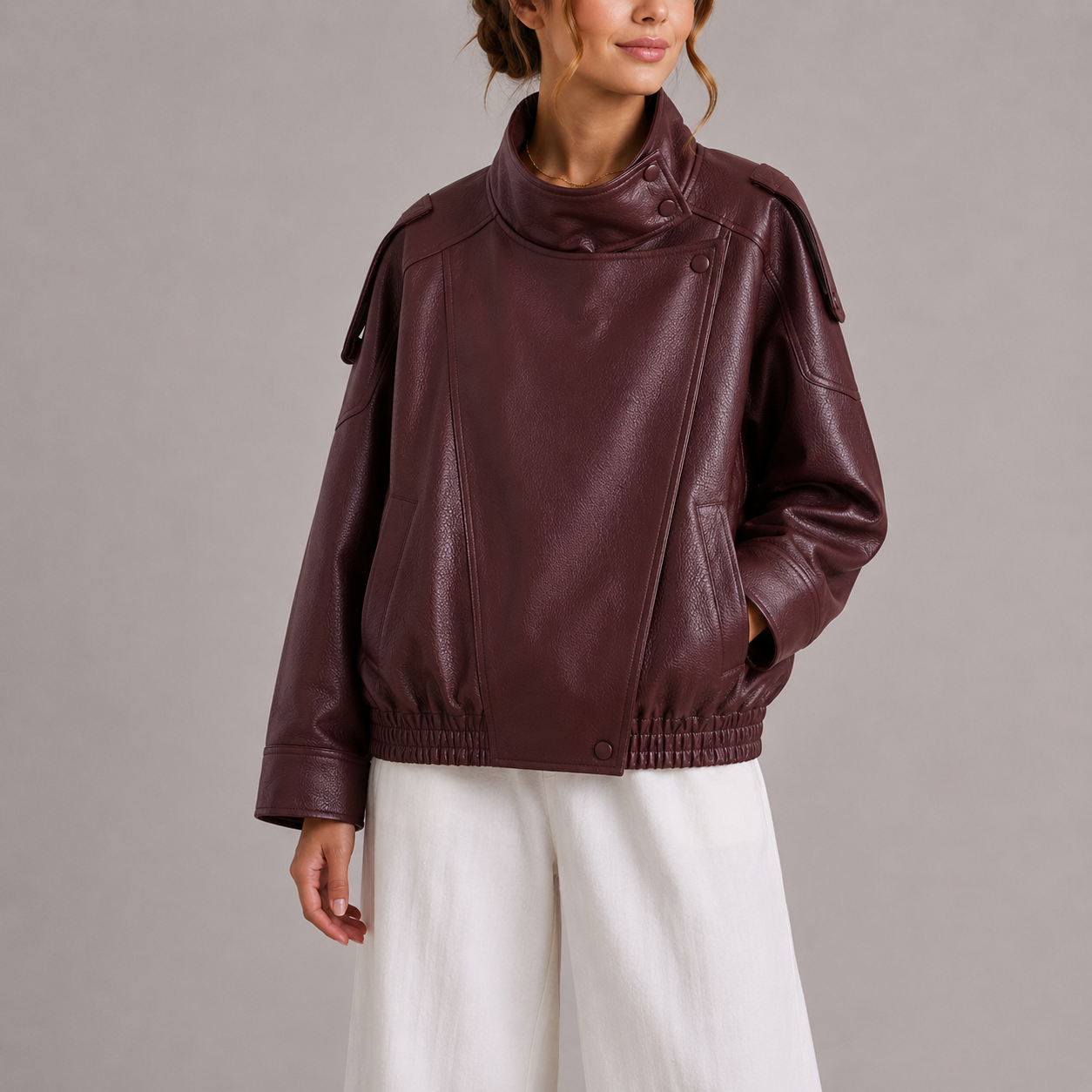 Haven Women's Bomber Jacket featuring a stylish faux leather design, high collar, and oversized fit, perfect for trendy fall and winter outfits. 3