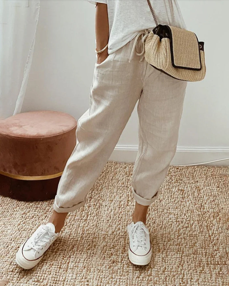 Helga Women's Trousers featuring a flattering fit and breathable design, perfect for comfort and style in any casual or professional setting. 0