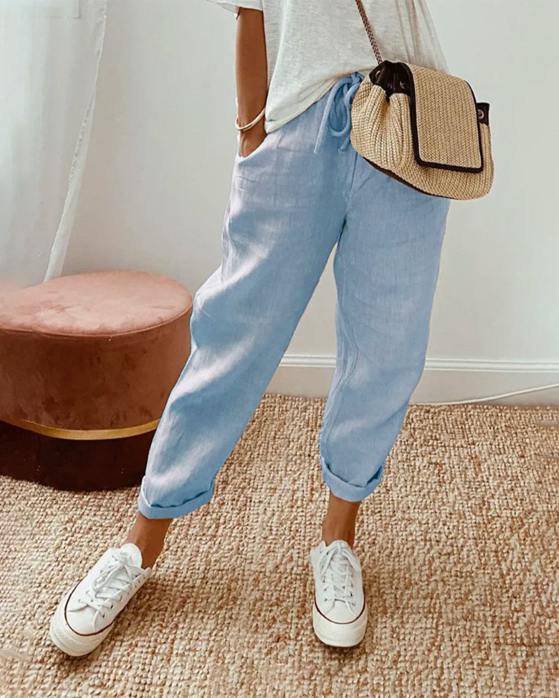 Helga Women's Trousers featuring a flattering fit and breathable design, perfect for comfort and style in any casual or professional setting. 2