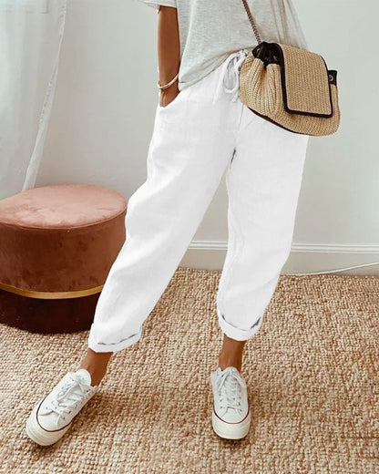 Helga Women's Trousers featuring a flattering fit and breathable design, perfect for comfort and style in any casual or professional setting. 3