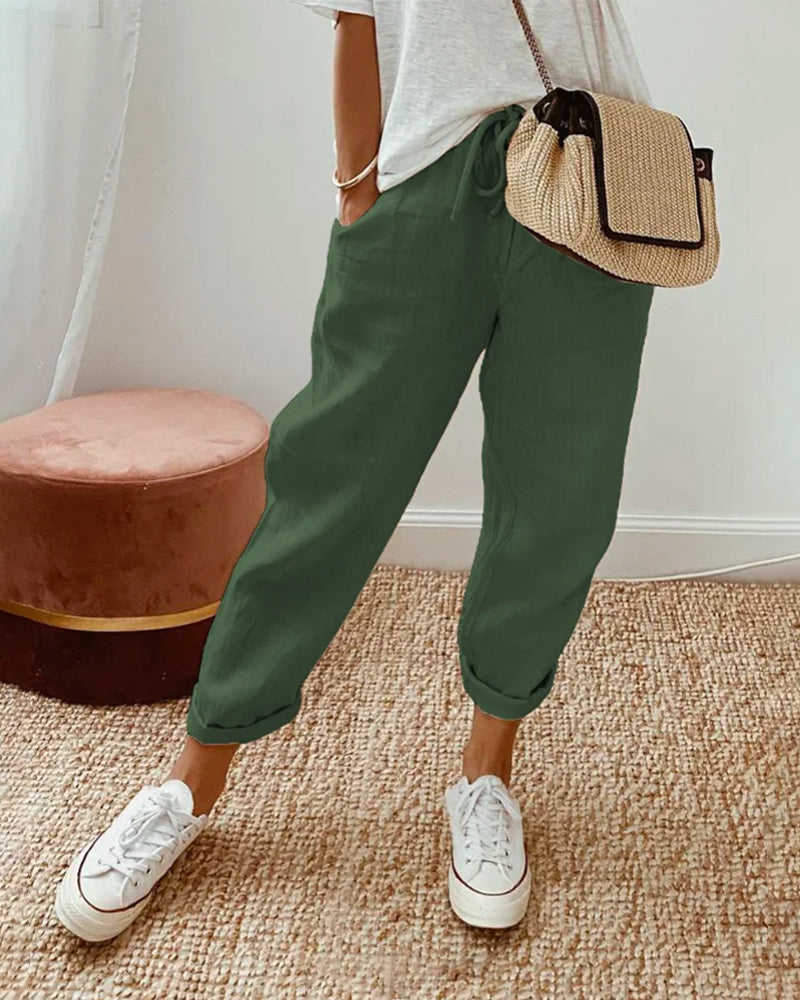Helga Women's Trousers featuring a flattering fit and breathable design, perfect for comfort and style in any casual or professional setting. 4