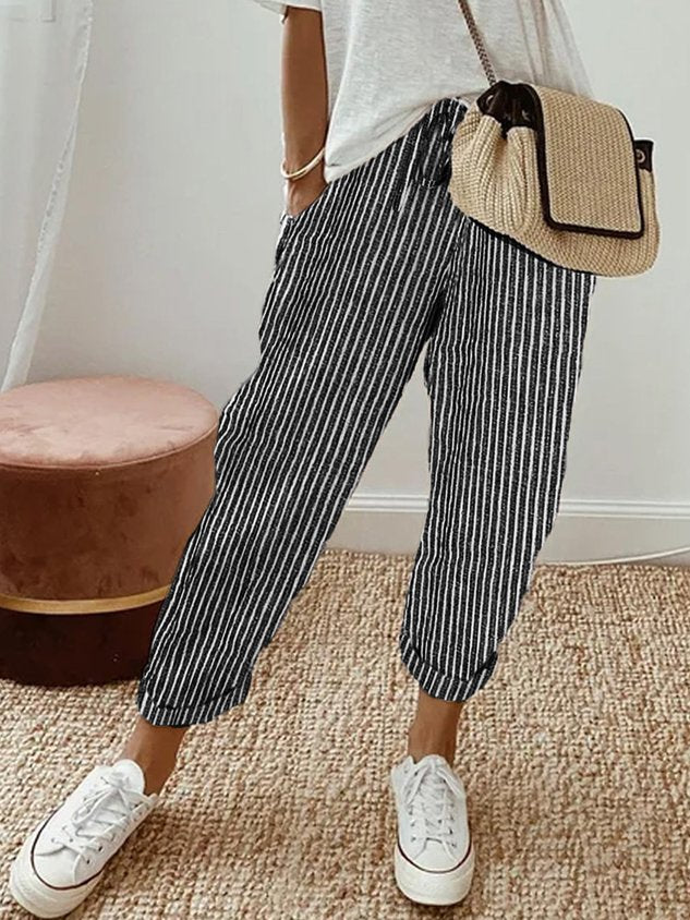 Helga Women's Trousers featuring a flattering fit and breathable design, perfect for comfort and style in any casual or professional setting. 8