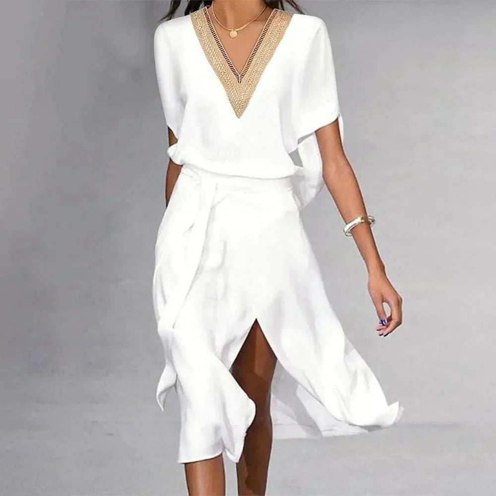 Ivy Women’s Dress featuring a stylish V-Neck design and a flattering fit, perfect for versatile wear in various occasions. 0
