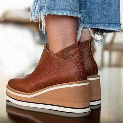 Jade women's waterproof boots featuring a stylish design, side zipper for easy wear, and durable construction perfect for all weather conditions. 4