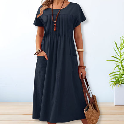 Jade women's summer dress featuring a relaxed fit and convenient side pockets, perfect for comfortable and stylish warm-weather wear. 0
