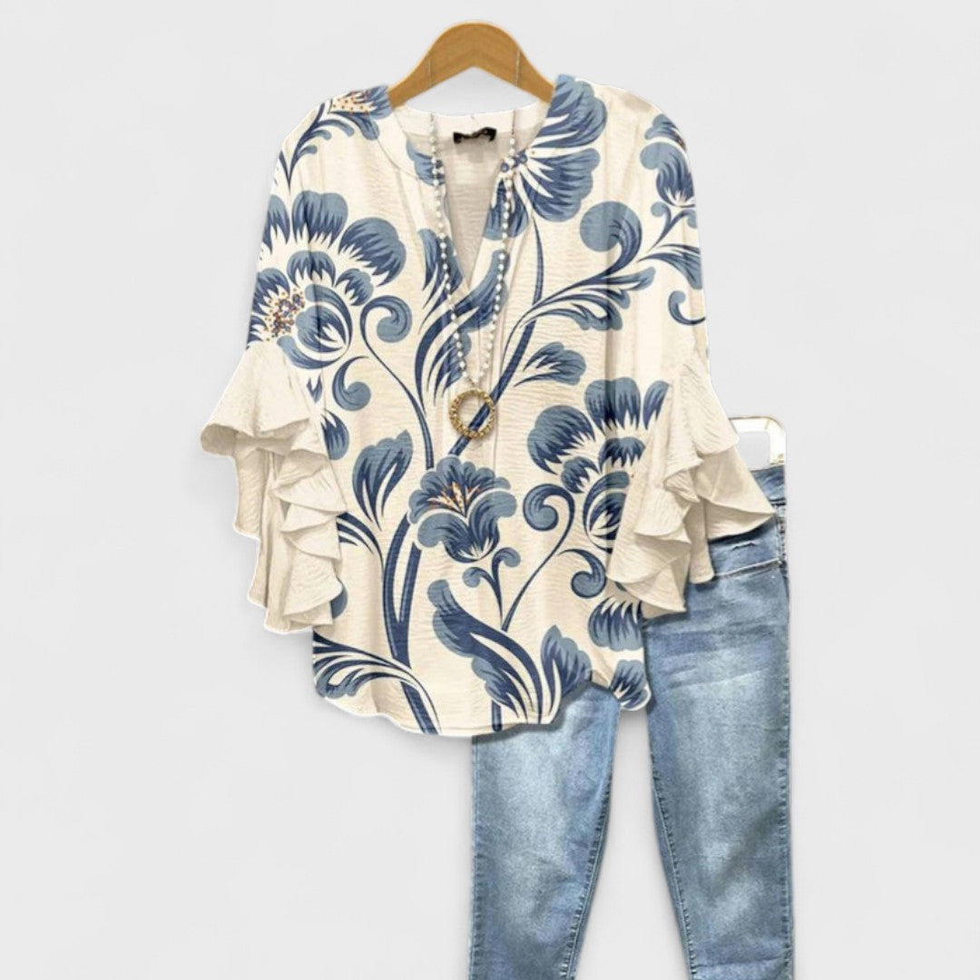 Kara Women’s Blouse featuring a lightweight and airy design, perfect for summer wear, showcasing a stylish and comfortable fit ideal for warm weather outings. 0