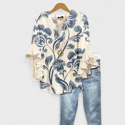 Kara Women’s Blouse featuring a lightweight and airy design, perfect for summer wear, showcasing a stylish and comfortable fit ideal for warm weather outings. 0