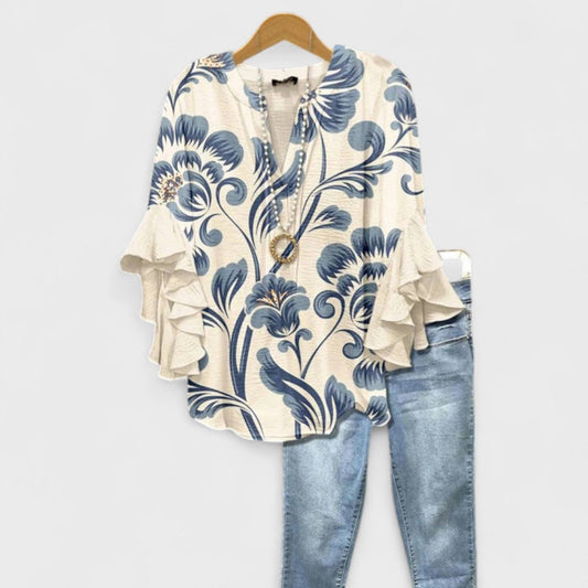 Kara Women’s Blouse featuring a lightweight and airy design, perfect for summer wear, showcasing a stylish and comfortable fit ideal for warm weather outings. 0