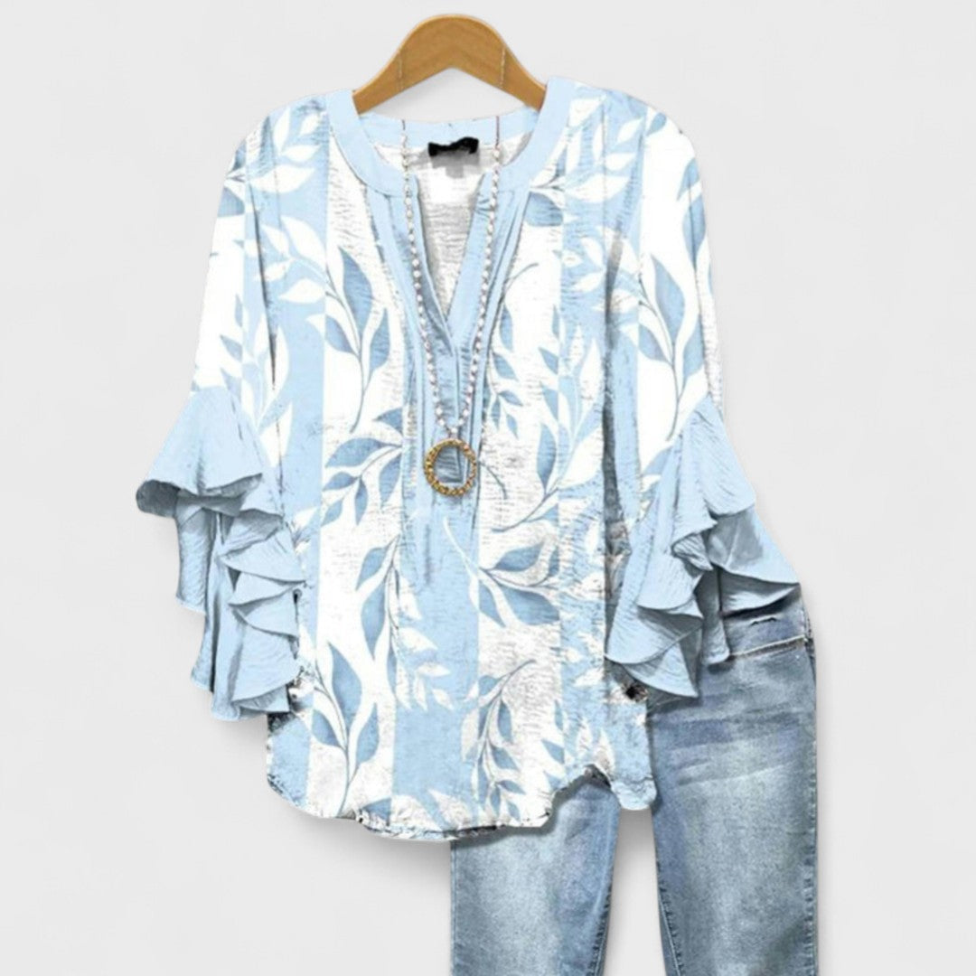 Kara Women’s Blouse featuring a lightweight and airy design, perfect for summer wear, showcasing a stylish and comfortable fit ideal for warm weather outings. 1