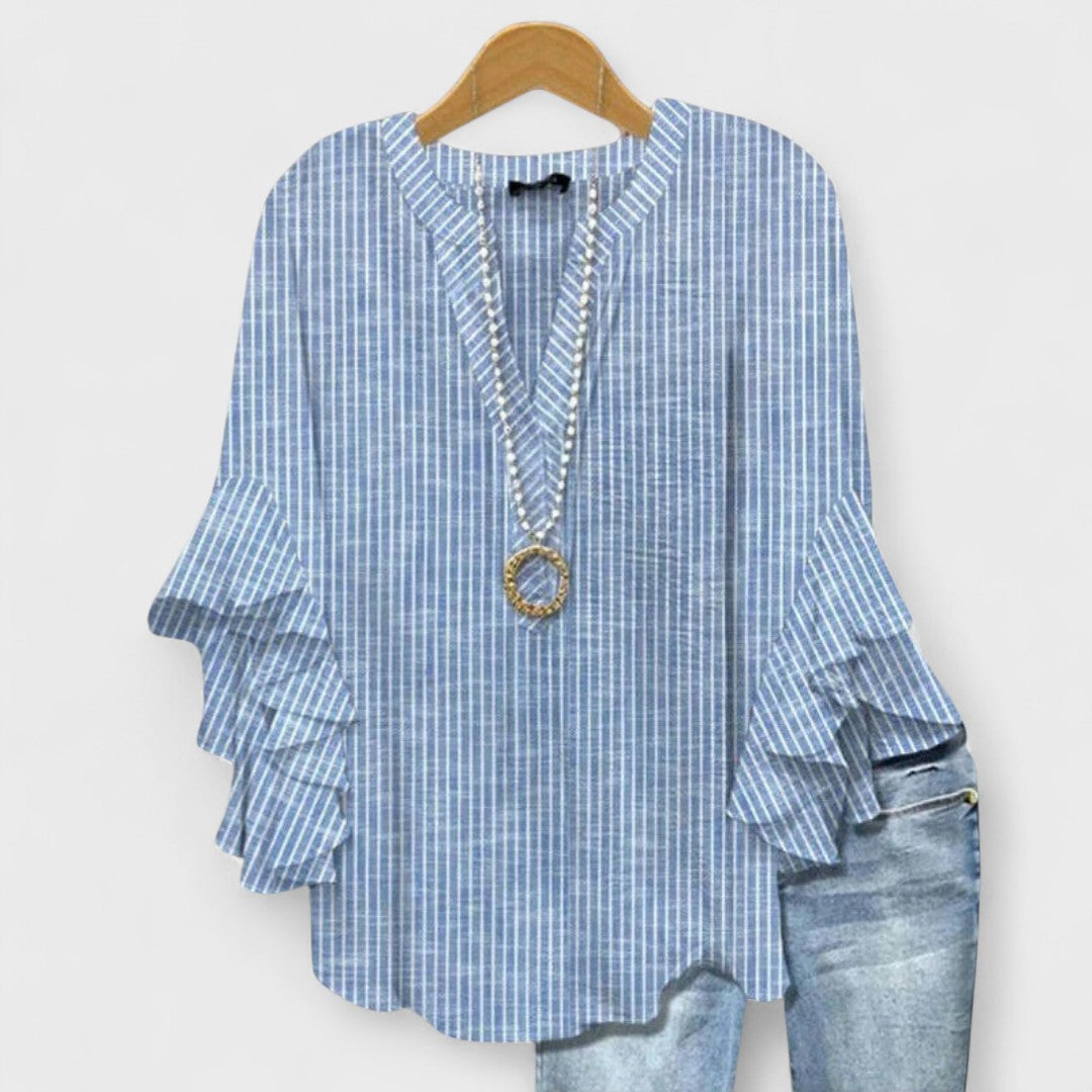 Kara Women’s Blouse featuring a lightweight and airy design, perfect for summer wear, showcasing a stylish and comfortable fit ideal for warm weather outings. 2