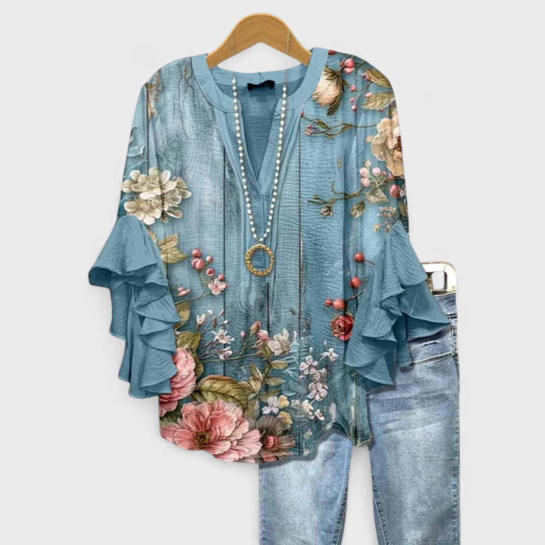 Kara Women’s Blouse featuring a lightweight and airy design, perfect for summer wear, showcasing a stylish and comfortable fit ideal for warm weather outings. 6