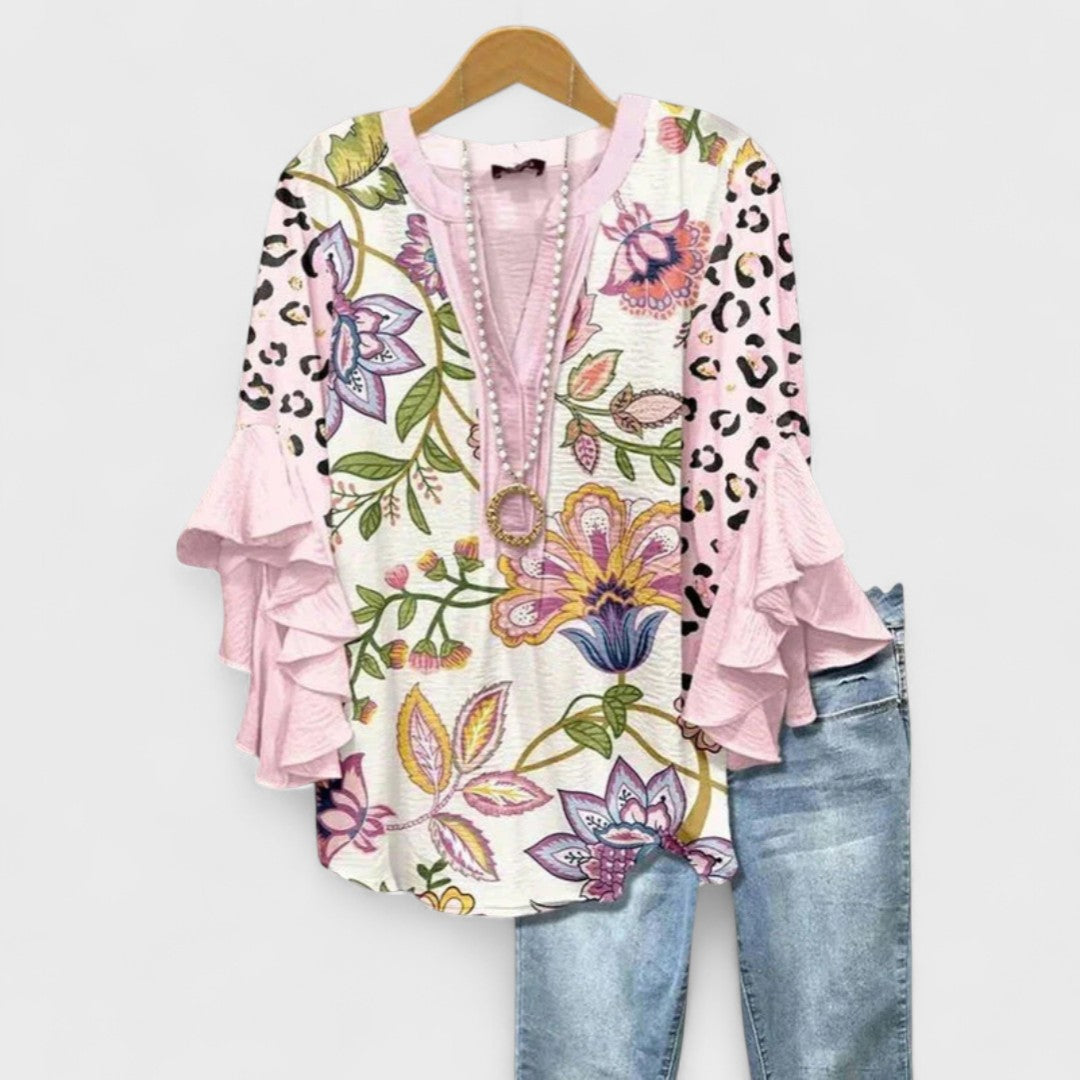 Kara Women’s Blouse featuring a lightweight and airy design, perfect for summer wear, showcasing a stylish and comfortable fit ideal for warm weather outings. 8