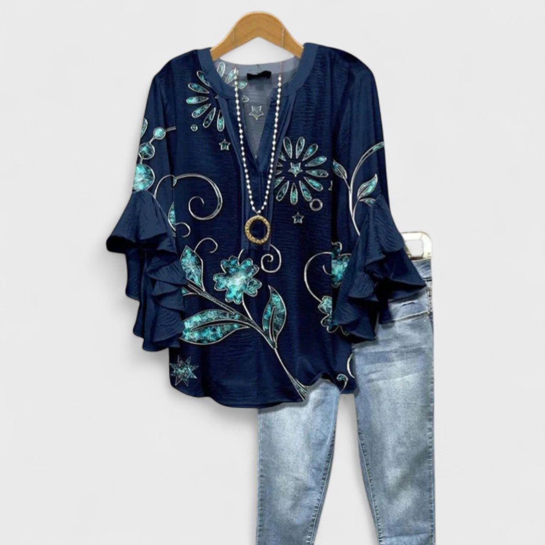 Kara Women’s Blouse featuring a lightweight and airy design, perfect for summer wear, showcasing a stylish and comfortable fit ideal for warm weather outings. 9