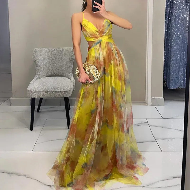 Kara Women’s Maxi Dress featuring a vibrant floral print and adjustable back closure, perfect for summer outings and special occasions. 2