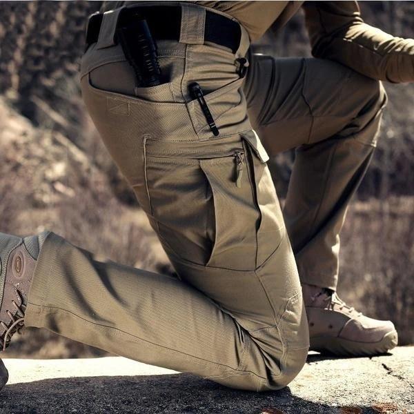 Keen Men's Cargo Pants featuring multiple pockets and reinforced seams, ideal for outdoor activities and durable wear. 2