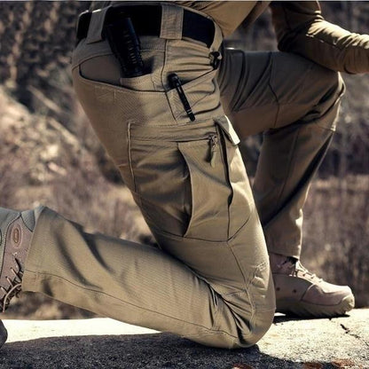 Keen Men's Cargo Pants featuring multiple pockets and reinforced seams, ideal for outdoor activities and durable wear. 2