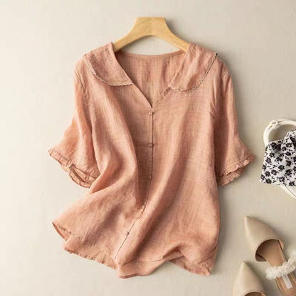 Kris Women's Blouse featuring a stylish scalloped collar and elegant button detail, designed for a chic and sophisticated look. 1