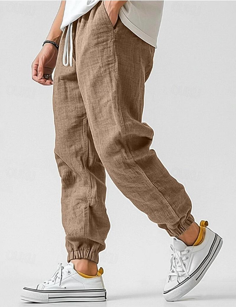 Lino Men’s Jogger Trousers featuring a relaxed fit and tapered ankles, perfect for casual wear and comfortable styling. 1