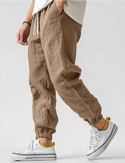 Lino Men’s Jogger Trousers featuring a relaxed fit and tapered ankles, perfect for casual wear and comfortable styling. 1