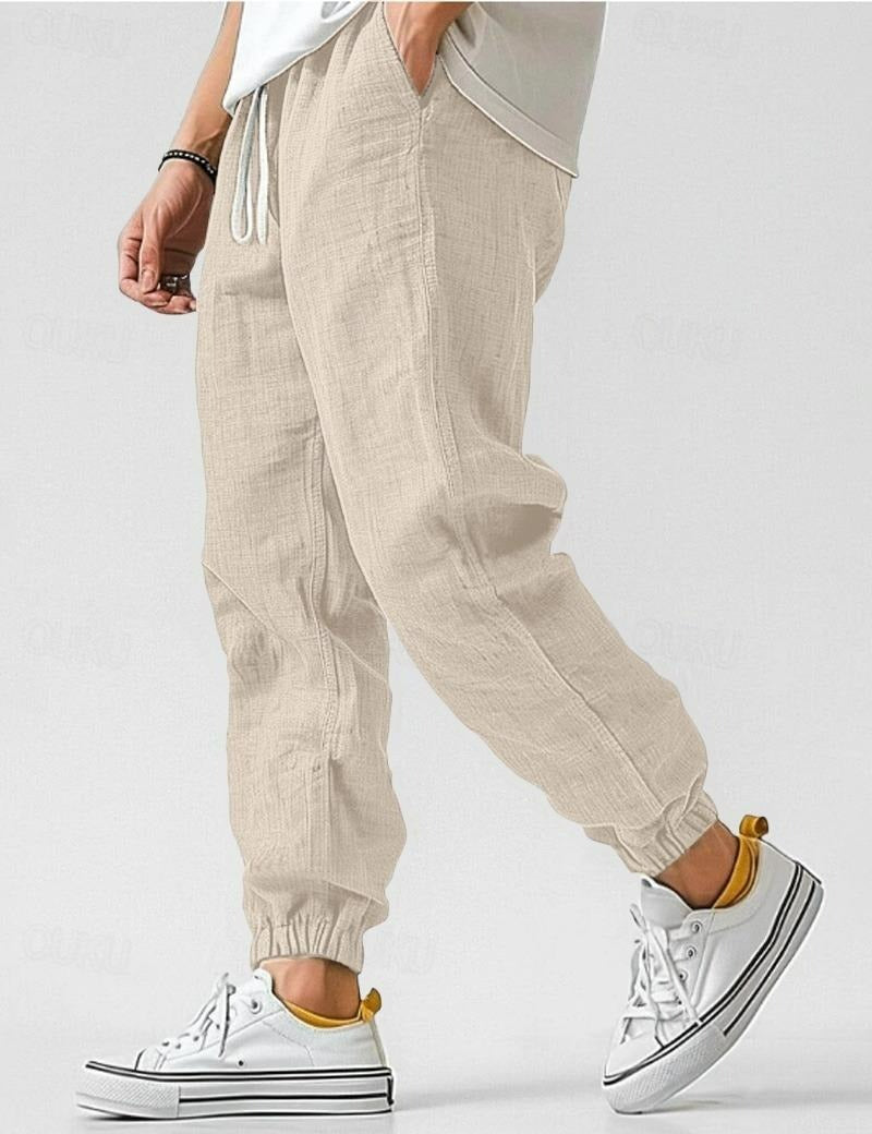 Lino Men’s Jogger Trousers featuring a relaxed fit and tapered ankles, perfect for casual wear and comfortable styling. 4