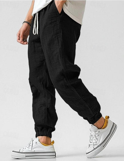 Lino Men’s Jogger Trousers featuring a relaxed fit and tapered ankles, perfect for casual wear and comfortable styling. 5
