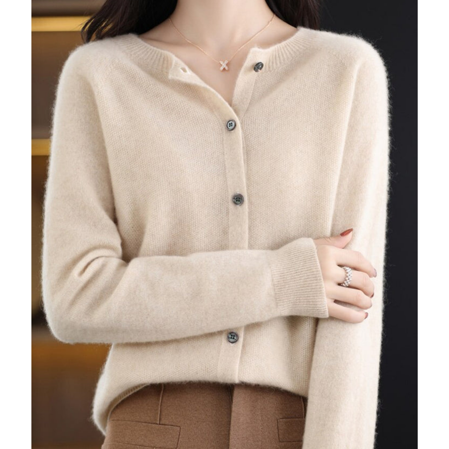 Luxe women's cardigan featuring an elegant O-neck design and full button closure, perfect for achieving effortless style in any season. 11