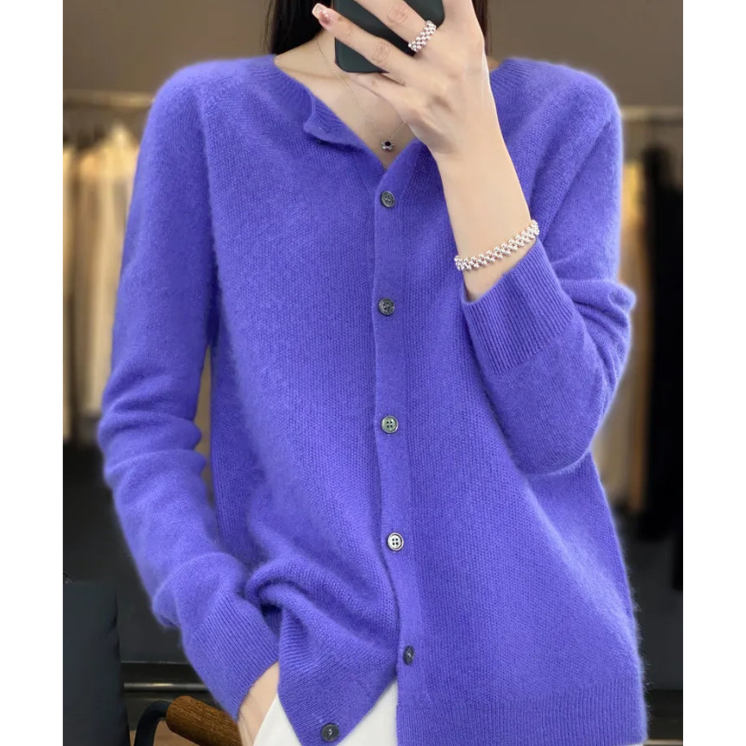 Luxe women's cardigan featuring an elegant O-neck design and full button closure, perfect for achieving effortless style in any season. 2