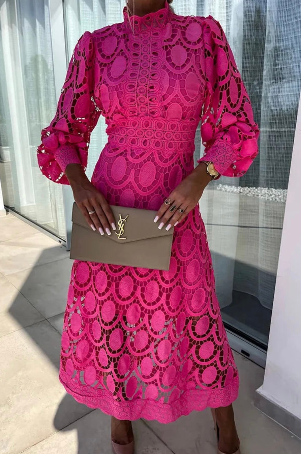 Luxe women’s dress featuring intricate lace detailing and a flattering midi length, perfect for elegant occasions and stylish outings. 0