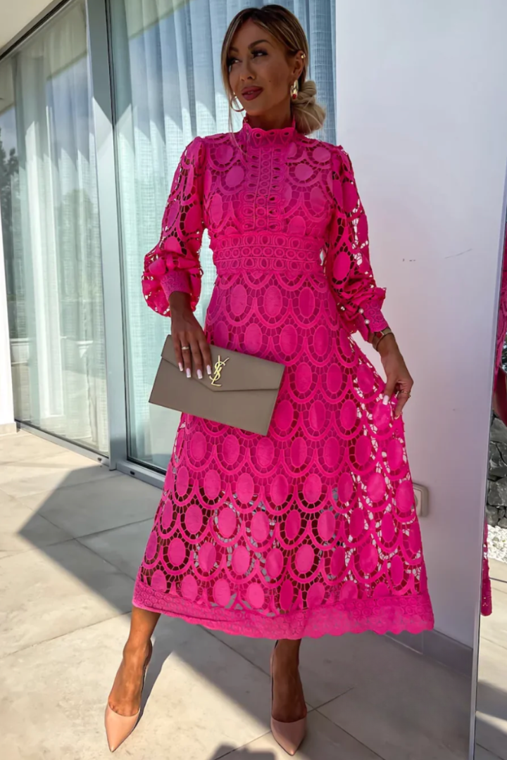 Luxe women’s dress featuring intricate lace detailing and a flattering midi length, perfect for elegant occasions and stylish outings. 4