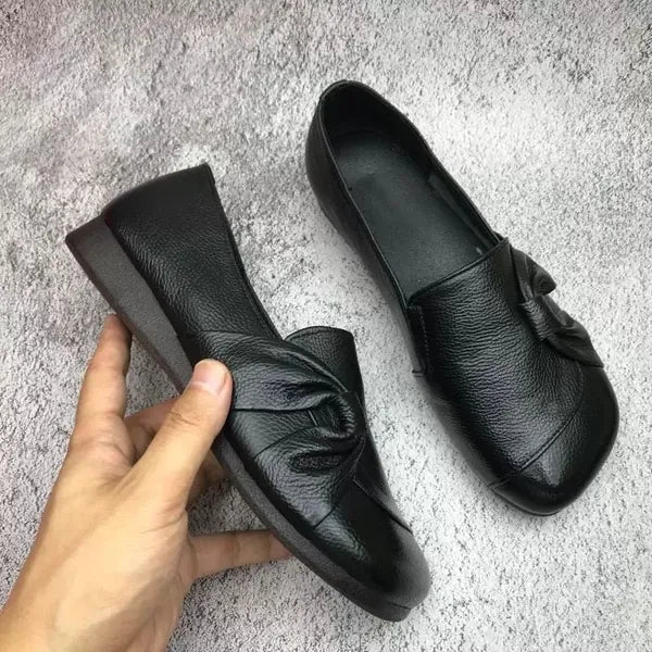 Luxe women’s leather shoes featuring a supportive insole and elegant embossed upper design, ideal for stylish comfort and all-day wear. 0