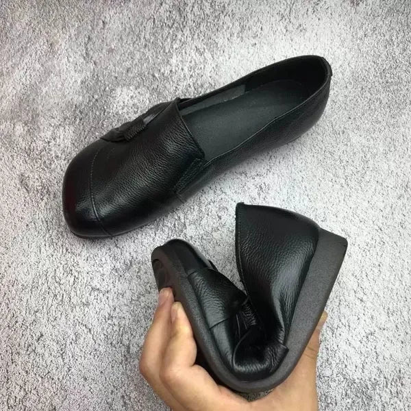 Luxe women’s leather shoes featuring a supportive insole and elegant embossed upper design, ideal for stylish comfort and all-day wear. 1
