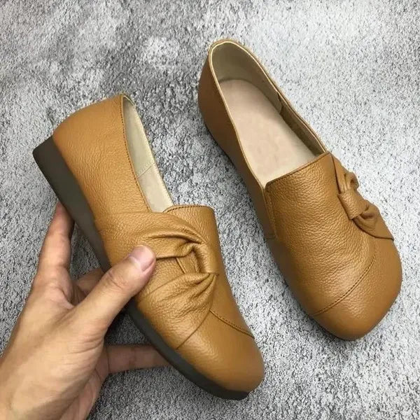 Luxe women’s leather shoes featuring a supportive insole and elegant embossed upper design, ideal for stylish comfort and all-day wear. 6