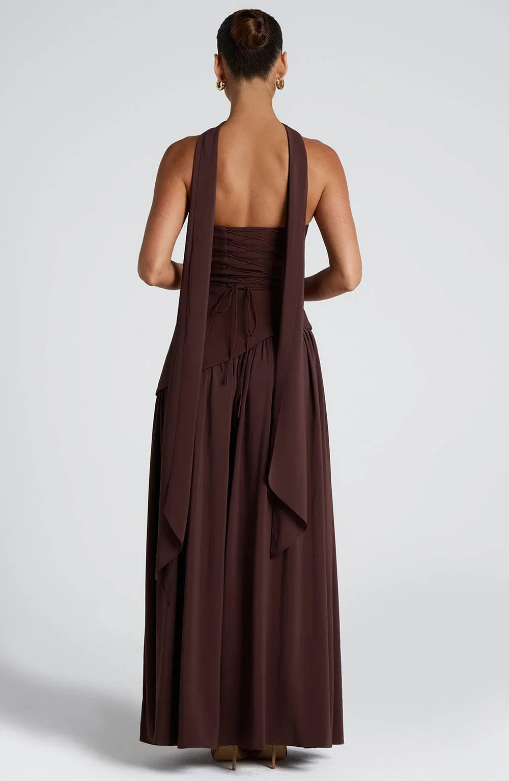Luxe women’s maxi dress featuring a corset bustier and elegant scarf detail, perfect for formal occasions and summer events. 2