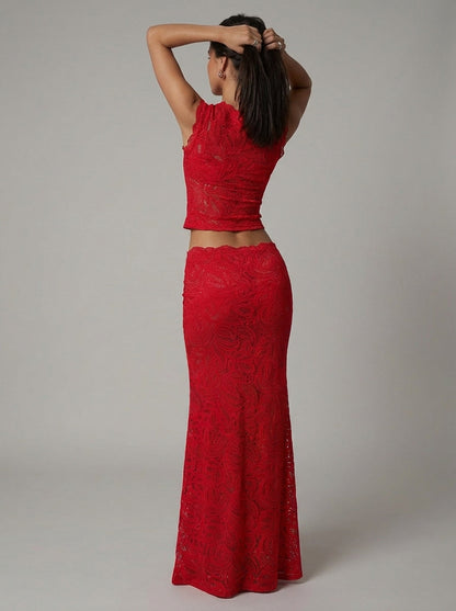 Luxe women's set featuring a stylish cropped lace top paired with a high-waisted maxi skirt, perfect for elegant occasions and summer outings. 2