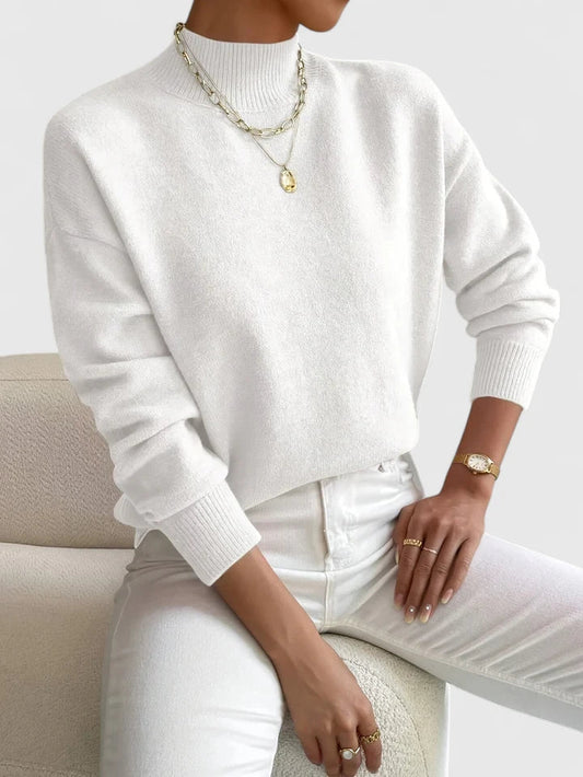 Marchelina Women’s Roll Neck Jumper featuring an elegant collar and a comfortable fit, perfect for stylish layering in any season. 0