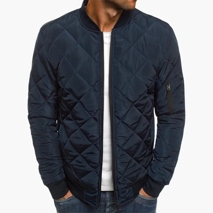 Maverick Men's Jacket featuring a stylish quilted design and practical zippered pockets, perfect for outdoor adventures and casual wear. 0