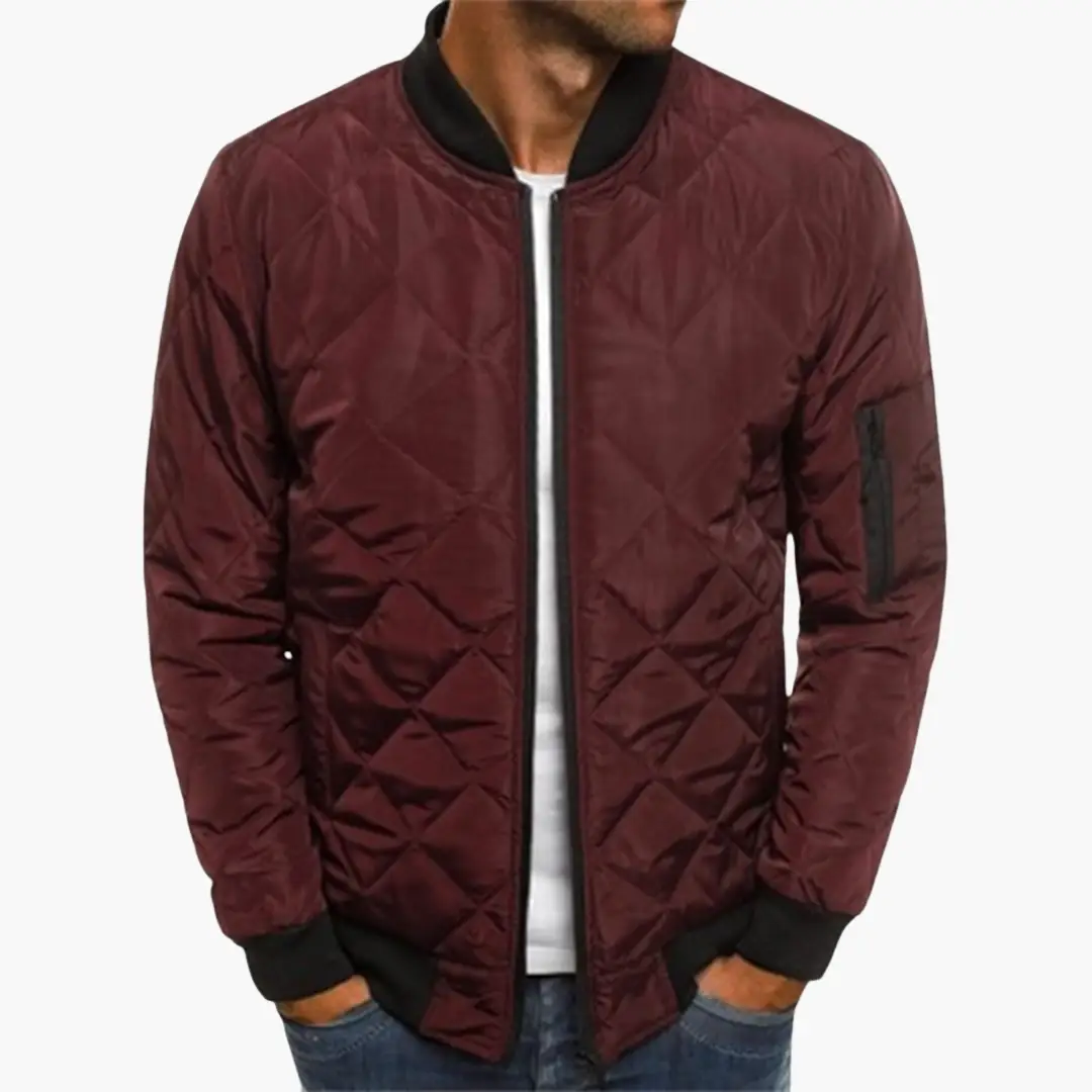 Maverick Men's Jacket featuring a stylish quilted design and practical zippered pockets, perfect for outdoor adventures and casual wear. 1
