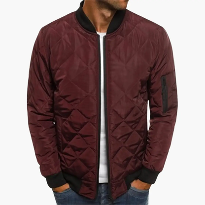 Maverick Men's Jacket featuring a stylish quilted design and practical zippered pockets, perfect for outdoor adventures and casual wear. 1