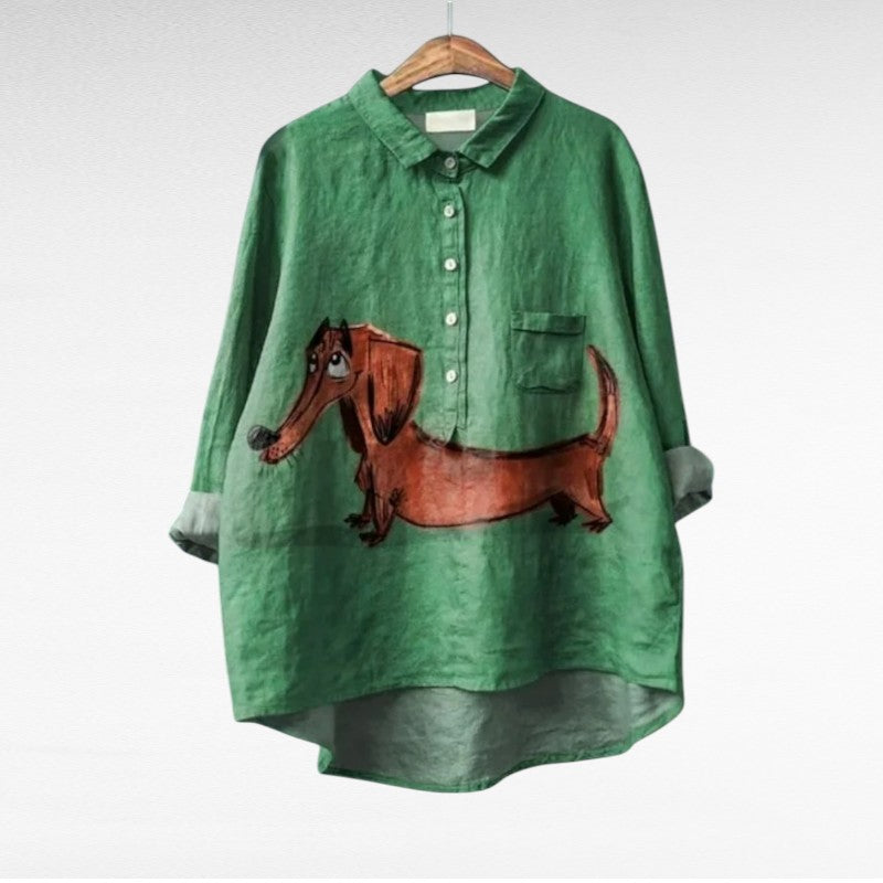 Meliora Women’s Blouse featuring a vintage dog print, designed with a relaxed fit for comfort and style. 0