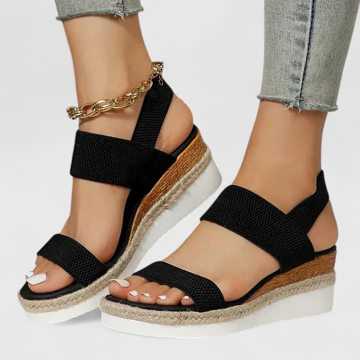 Mera Women’s Sandals featuring arch support and a cushioned sole designed for all-day comfort, perfect for casual wear and outdoor activities. 1
