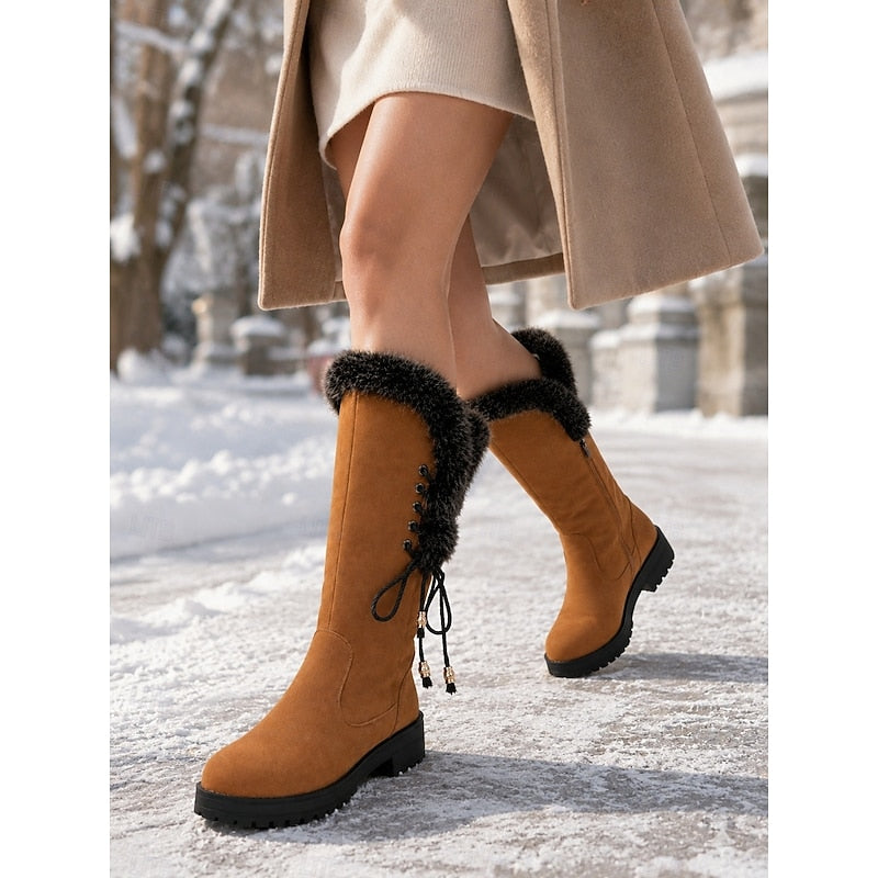Meredith Women's Knee-High Winter Boots featuring a stylish fur trim, designed for warmth and comfort in cold weather. 3