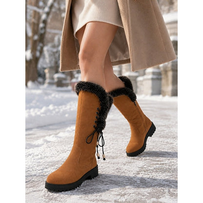 Meredith Women's Knee-High Winter Boots featuring a stylish fur trim, designed for warmth and comfort in cold weather. 3