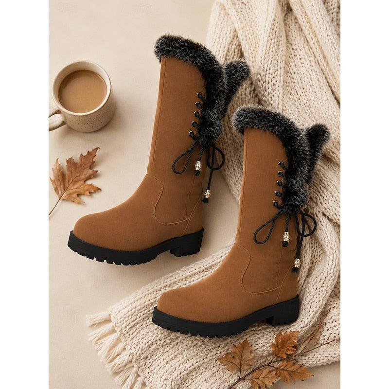 Meredith Women's Knee-High Winter Boots featuring a stylish fur trim, designed for warmth and comfort in cold weather. 6